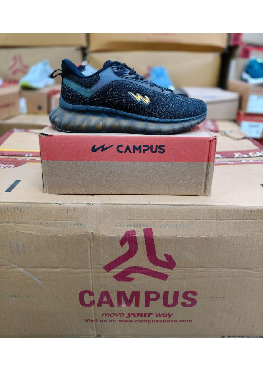 Side profile of a Campus men's chunky lifestyle sneaker in black with gold accents and a thick translucent wavy midsole
