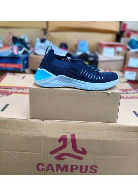 Side profile of a Campus men's navy knit slip-on sneaker with a light grey sole and cyan heel accent