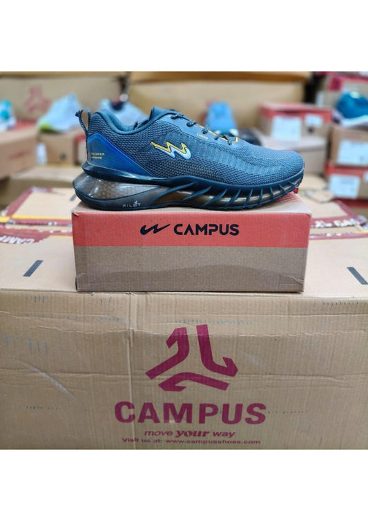 Navy Campus Pilot running shoe with knit upper, blue heel counter, yellow logo, and translucent Pilot heel unit.