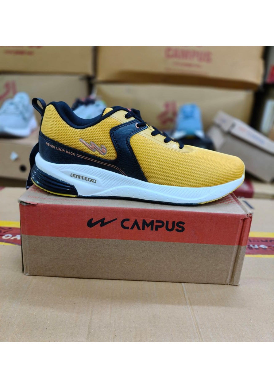Side profile of a Campus Raceday men's running shoe in mustard yellow and black with a white midsole
