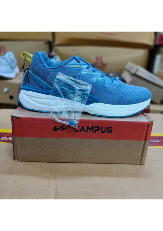 Side profile of a Campus men's running shoe in teal blue with a thick white midsole and yellow heel pull tab