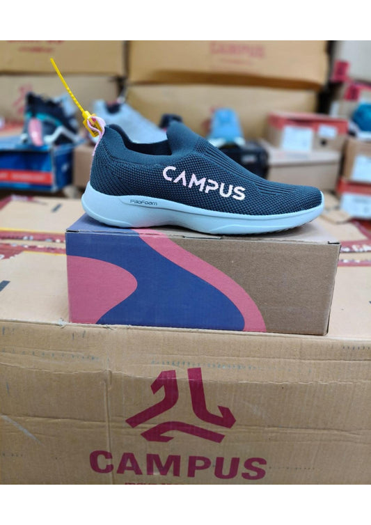 Side view of a Campus PilloFoam slip-on walking shoe in teal knit with pink logo and a light blue cushioned sole