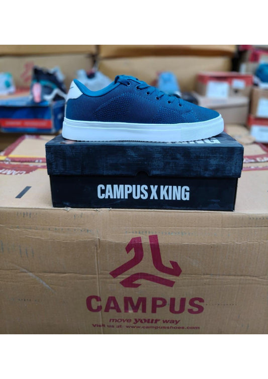 Navy Campus X King sneaker with knitted upper and thick white cupsole on black branded box.