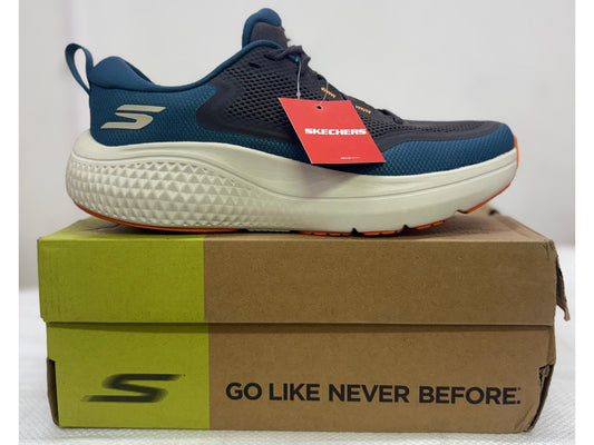 Side view of a navy and teal Skechers GO RUN shoe with orange outsole accents and chunky white midsole
