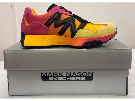 Vibrant pink, orange and yellow Mark Nason x Skechers lifestyle sneaker with gradient midsole on silver box.